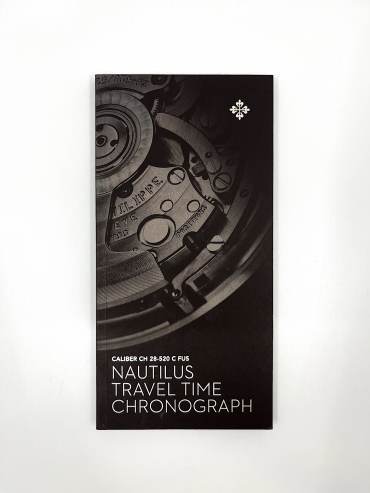 pre owned PATEK PHILIPPE NAUTILUS  TRAVEL TIME CHRONOGRAPH